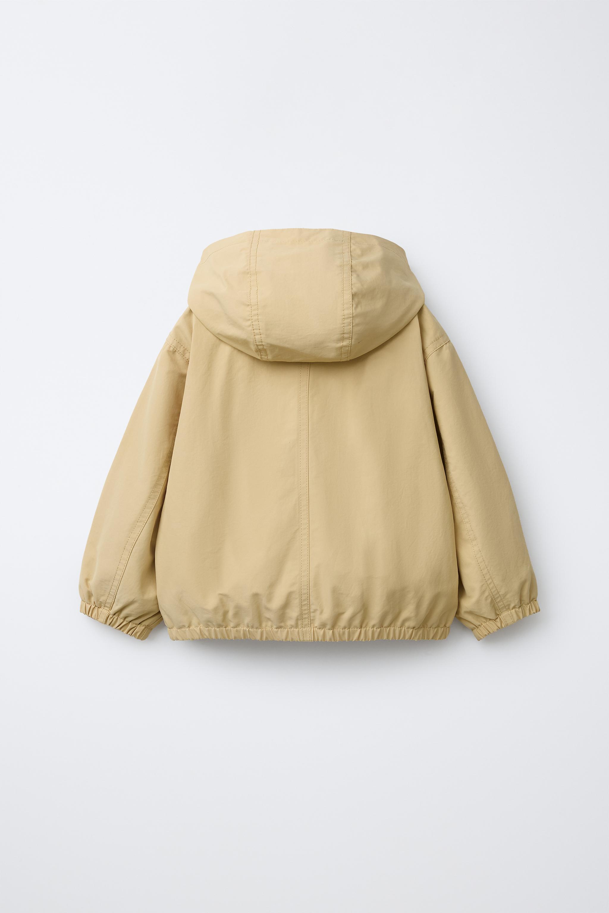 BLOUSON LÉGER À CAPUCHE